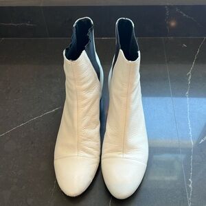 White boots with black elastic
